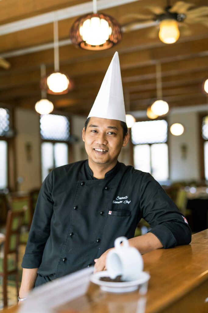 chef cooking commercial kitchen equipment